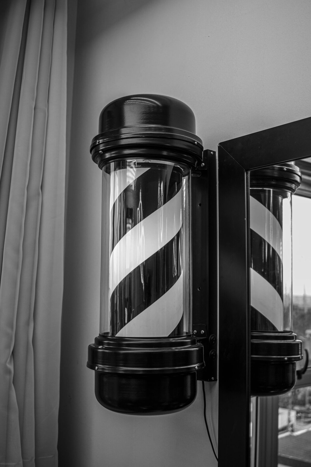 Detalhe — poste de barbearia